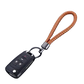 Vintage Handcrafted Metal Keychain with Rope Accents