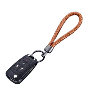 Vintage Handcrafted Metal Keychain with Rope Accents