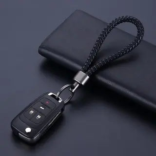 Vintage Handcrafted Metal Keychain with Rope Accents